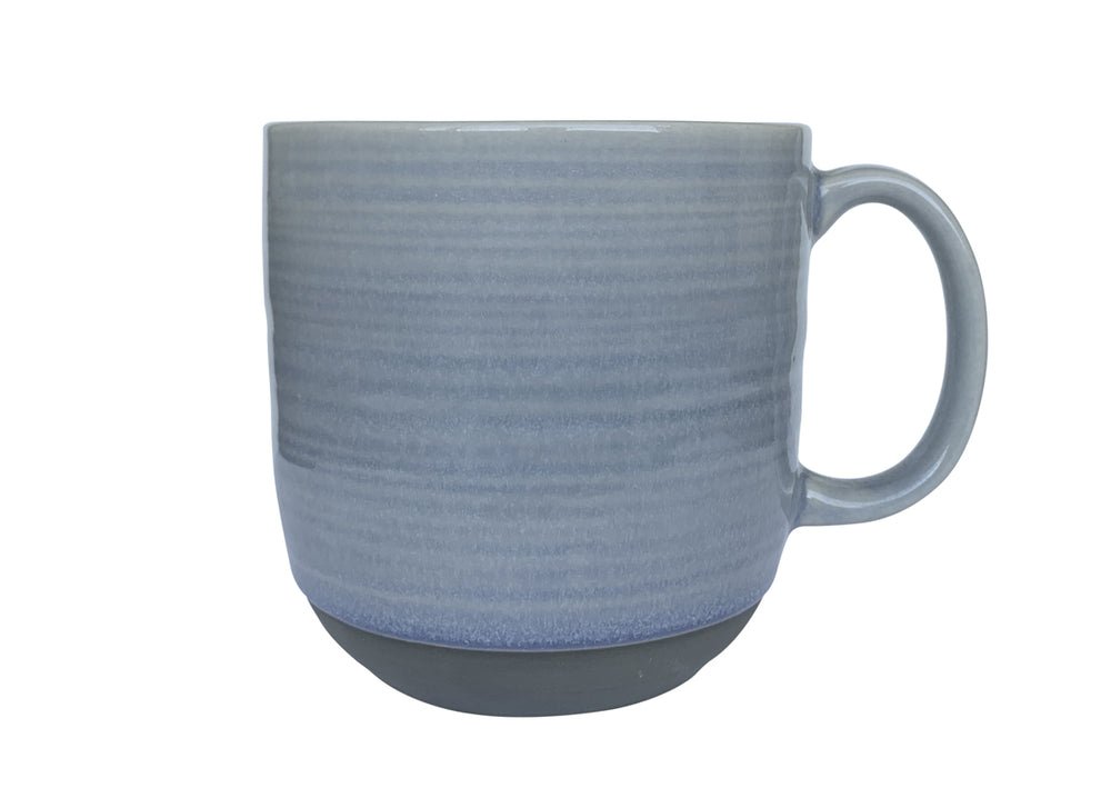 Light blue ceramic mug with clay base
